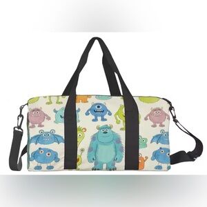 Monsters Print Travel Duffle Bag in Cream and Teal